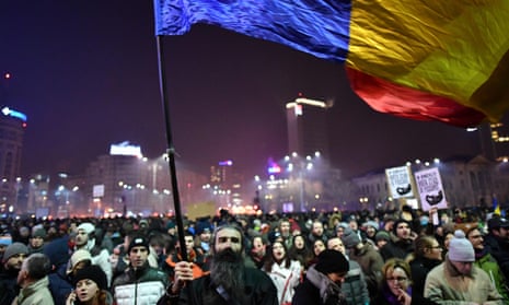 People demonstrate in the Romanian capital against the ordinance.