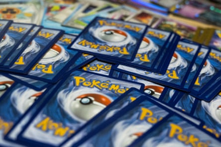 This photograph shows displayed collectible cards from the Pokémon Trading Card Game
