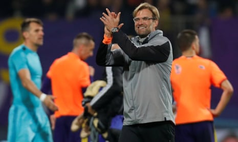 Liverpool manager Juergen Klopp applauds the fans at the end of the match.