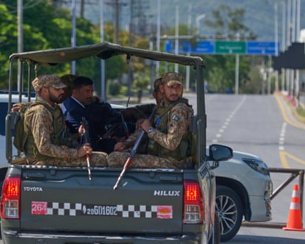 Army troops patrol to ensure security ahead of the second round of the US Iran officials talks, in Islamabad, Pakistan on Sunday.