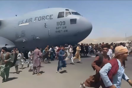 398879,Escape from Kabul AirportEscape from Kabul Airport,21-09-2022,Evacuees running alongside a C-17,Mirwais Khan Amiri,Mirwais Khan Amiri