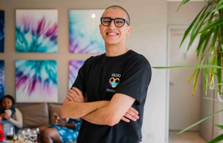 Yassine in black T-shirt and with black-framed glasses, who leads on digital rights at LGBTQ+ youth rights organisation IGLYO.