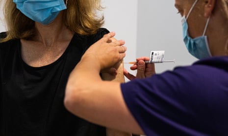woman receives a vaccination