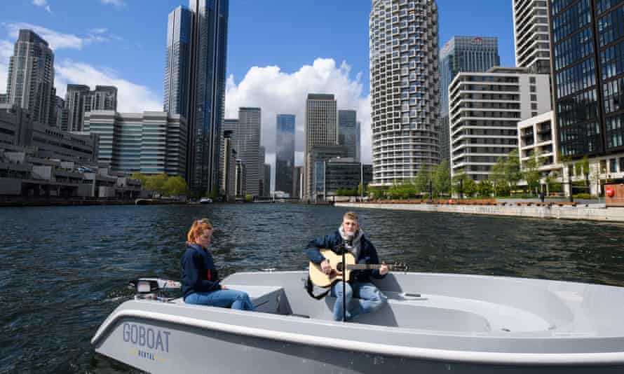 Singer Nathan Evans, who went viral on TikTok with a sea shanty, performs on a boat in Canary Wharf, London.