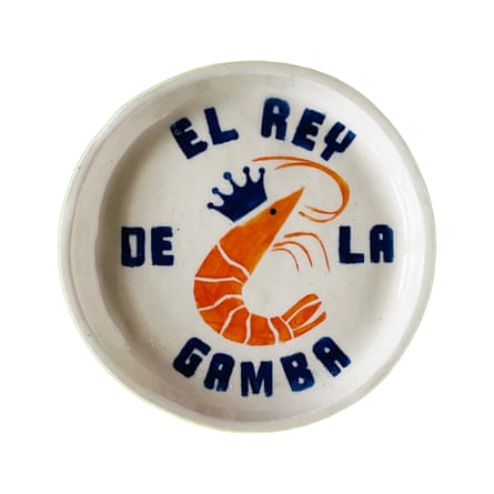 Camden Clay side plate featuring shrimp design in orange on white.