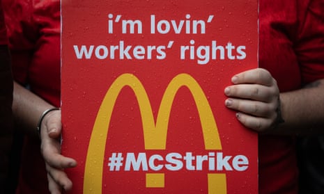 McDonald’s workers stage a protest outside Downing Street in London.