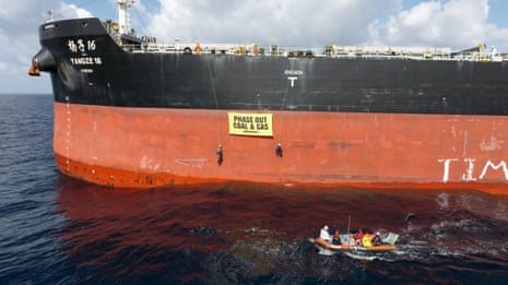 Greenpeace Australia Pacific activists have scaled and blocked a coal ship at Rising Tide.