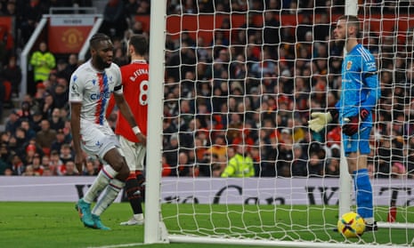 Manchester United's David de Gea reacts as Crystal Palace's Odsonne Edouard looks on after Jeffrey Schlupp scores their first goal.