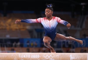 Simone Biles of the United States in action on the balance beam.