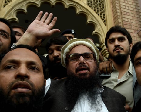 Hafiz Saeed, center, was released before dawn on Friday.