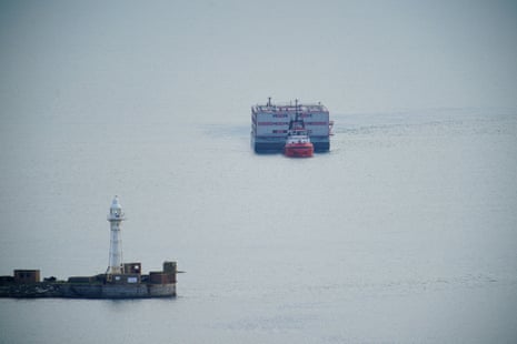 The tug boat Mercia pulling the Bibby Stockholm towards Portland in Dorset.