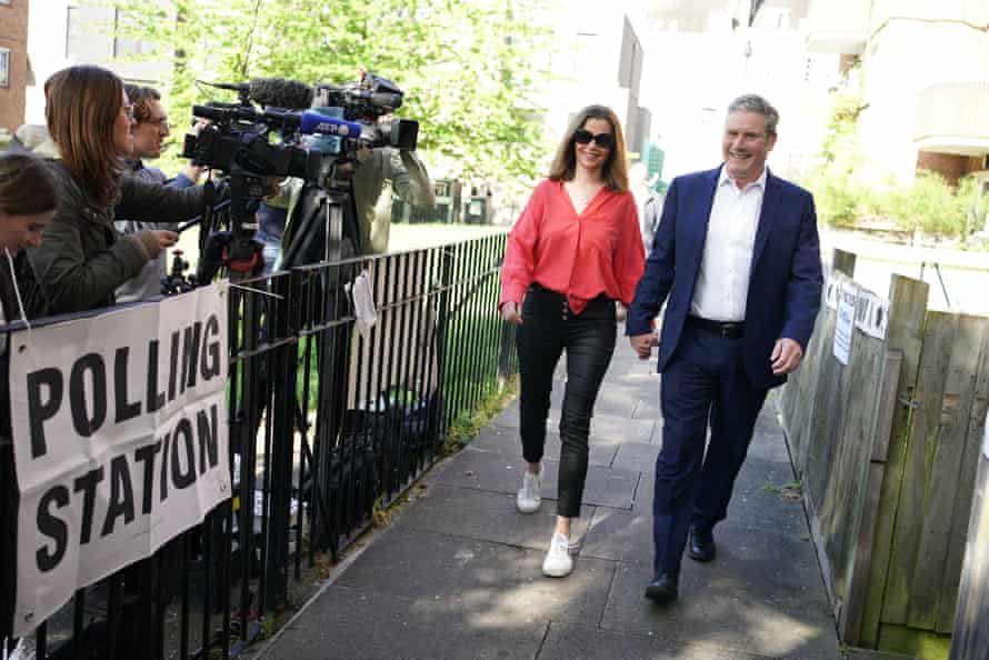 Keir Starmer and his wife, Victoria, arriving to vote this morning