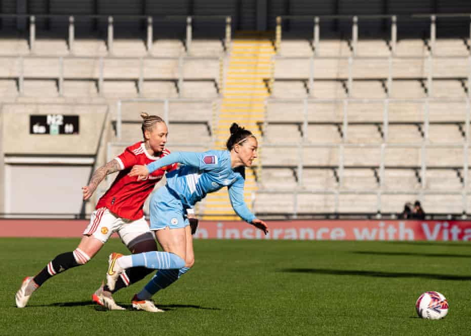 Manchester United's Leah Galton (left) and Manchester City's Lucy Bronze.