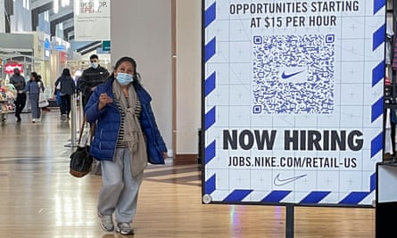 A help wanted sign appears in a shopping mall in Gurnee, Illinois, last month. Joe Biden added more jobs in 2021 than any president in his first year.