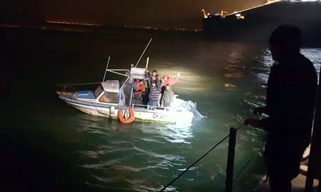 Iranian migrants being picked up by Fernch Coastguard (Gendarmerie Maritime) in Calais.