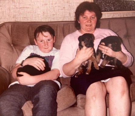 Kelman and his mother with some of the puppies he helped deliver.