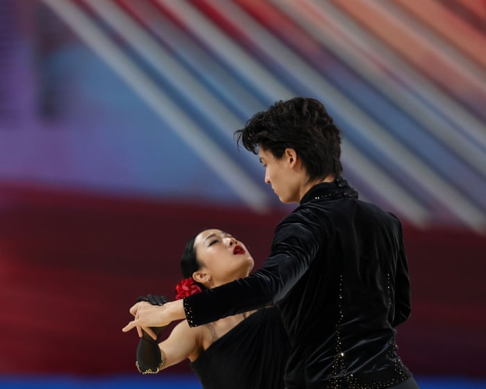 Chinese ice dancers under investigation after holding toy missile at event