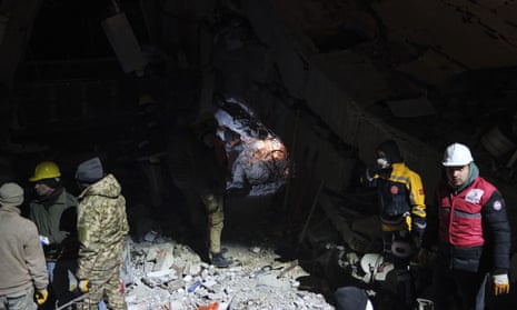 Personnel conduct search and rescue operations following the 7.7 and 7.6 magnitude earthquakes in Kahramanmaras, Turkey.