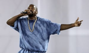 Kanye West performing onstage
