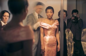 The actor and singer Eartha Kitt and the fashion designer Hubert de Givenchy in Paris, 1961. Vaccaro is reflected in the mirror