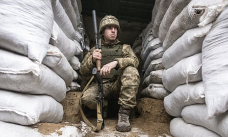 A Ukrainian soldier in the trench on the line of separation from pro-Russian rebels, Mariupol, Donetsk region, Ukraine, Friday, Jan. 21, 2022. Blinken said the U.S. would be open to a meeting between Putin and U.S. President Joe Biden, if it would be “useful and productive.” The two have met once in person in Geneva and have had several virtual conversations on Ukraine that have proven largely inconclusive. Washington and its allies have repeatedly promised consequences such as biting economic sanctions against Russia — though not military action — if it invades. (AP Photo/Andriy Dubchak)