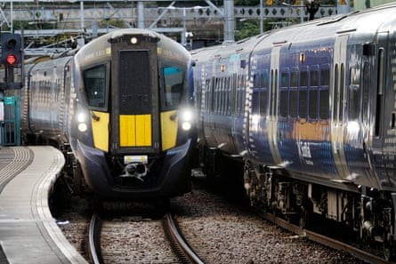 Two trains Waverley railway station in Edinburgh