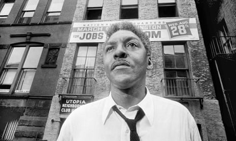 black and white picture of Bayard Rustin in front of a building in 1963