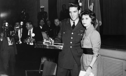 Sinatra with Elvis Presley on his last day of military service for her father’s TV show, 1960.