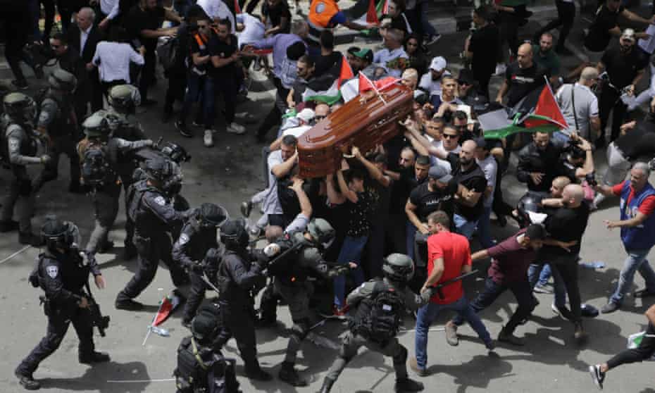 Israeli police clash with mourners at Shireen Abu Aqleh's funeral.