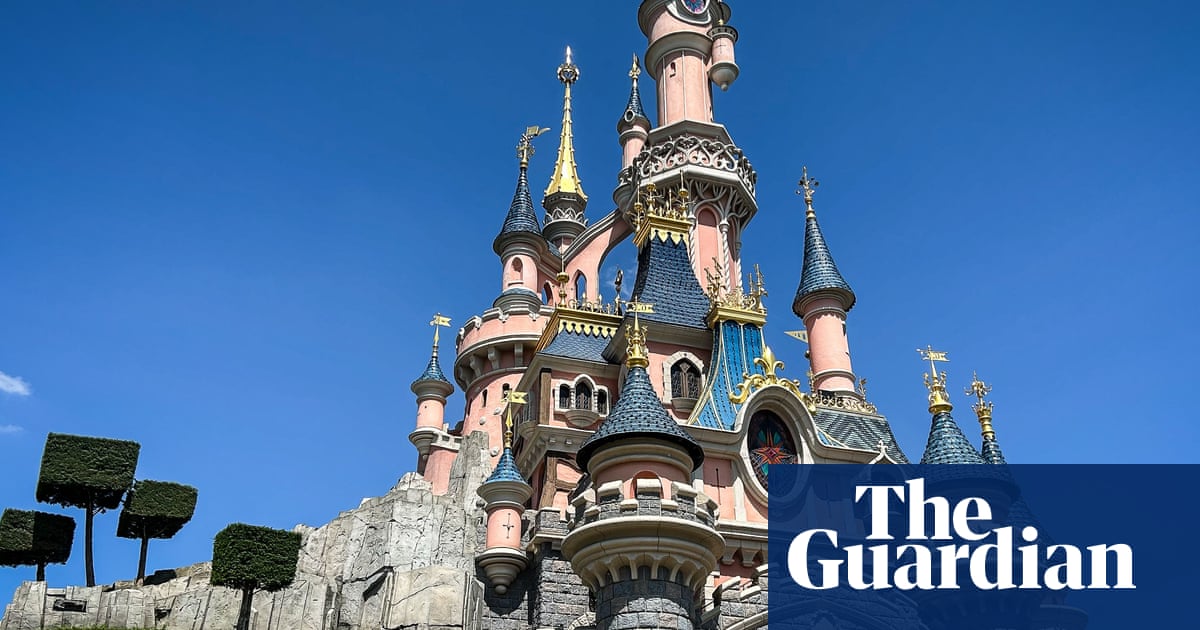 Briton accused of staging Disneyland mock wedding with child is charged with fraud offences in France