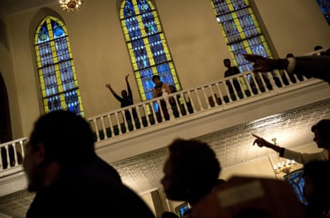 Mourners hold a prayer vigil at the First African Methodist Episcopal Church: Bethel, Harlem, New York City. 