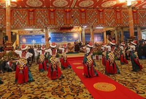 The Dalai Lama (C) watches a traditional dance performance during an event held in his honour, at the Main Tibetan Temple in McLeod Ganj, near Dharamsala on June 30, 2025.