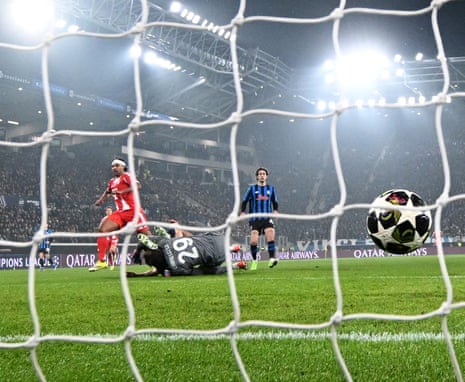 Serge Gnabry (left) tucks the ball home for Bayern Munich’s third goal of the night.