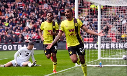 Lorenz Assignon wheels away after scoring Burnley’s second goal.