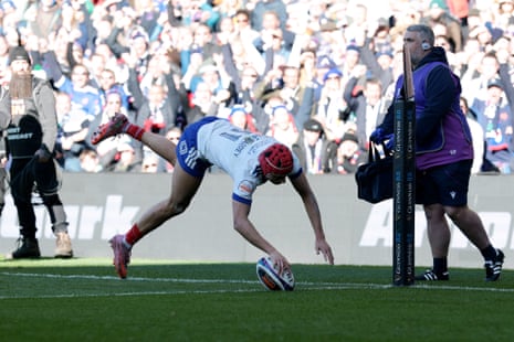 Louis Bielle-Biarrey of France dives over the line to scores his team's first try.