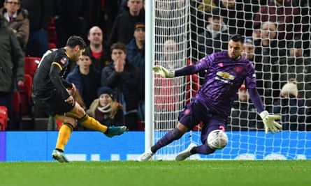 Wolves’ Neto rifles past Sergio Romero in the first half only for the effort to be disallowed by VAR for handball.