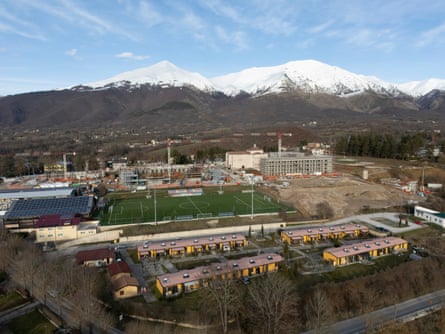 Photo of Amatrice in which you can see rows of small prefabricated terrace houses