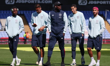 West Ham United’s players enjoy a stroll on the Selhurst Park pitch ahead of kick-off.