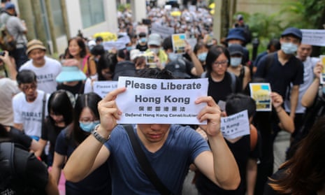 Hong Kong activists march to call for for foreign support for their fight against a controversial extradition bill.