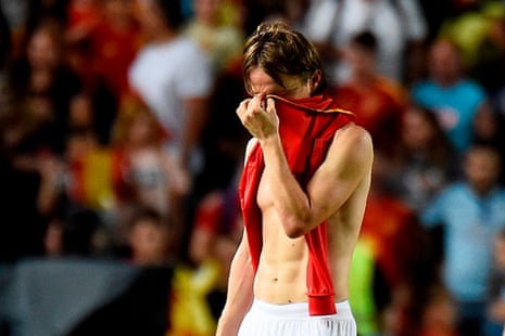Croatia’s midfielder Luka Modric looks crestfallen.