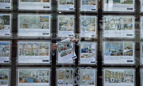Houses for sale in estate agent's window