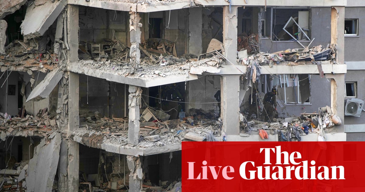 At least eight killed in Iranian strikes on Israel while Israeli attacks set Tehran oil depot on fire live updates