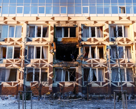 Employees remove debris at the site of a private hospital hit by Russian drone strikes, amid Russia's attack on Ukraine, in Kyiv, Ukraine.