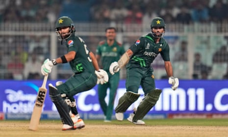 Pakistan's Abdullah Shafique, left, and Fakhar Zaman have a moment of hesitation as they run between the wickets.