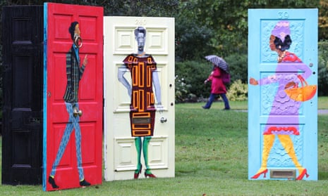 A woman walks past Lubaina Himid’s artwork Five Conversations in Regent’s Park, London