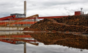 Logs outside a paper mill in Kajaani, Finland