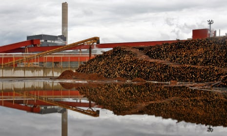Logs outside a paper mill in Kajaani, Finland