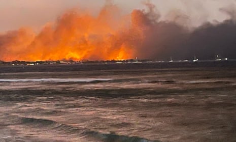 A view of flames near the ocean at the historic town of LahainaA view of flames as wildfires engulfed the historic town of Lahaina, Maui, Hawaii, U.S. August 9, 2023.