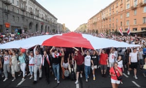 Opposition supporters flood the streets of Minsk.