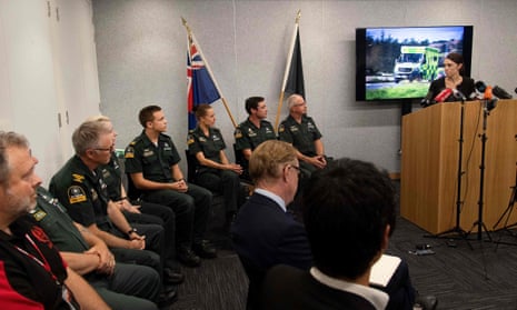 New Zealand Prime Minister Jacinda Ardern speaks with first responders to the scene after a gunman shot down 50 Muslims at two mosques.